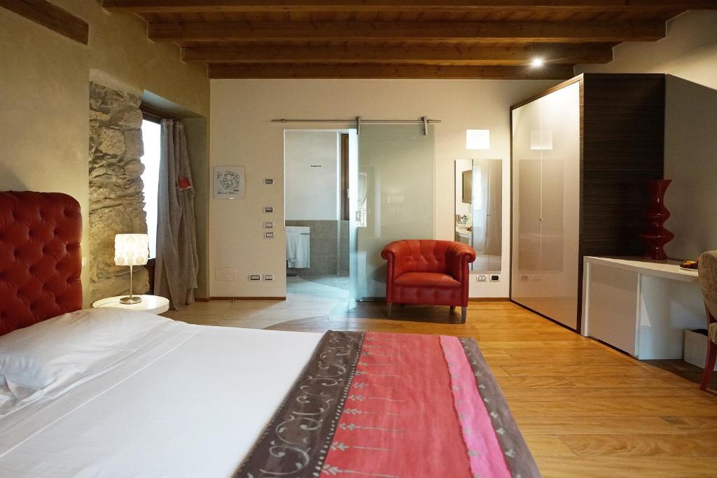 Postel nebo postele na pokoji v ubytování Il Portico - 1711 Luxury Guest House