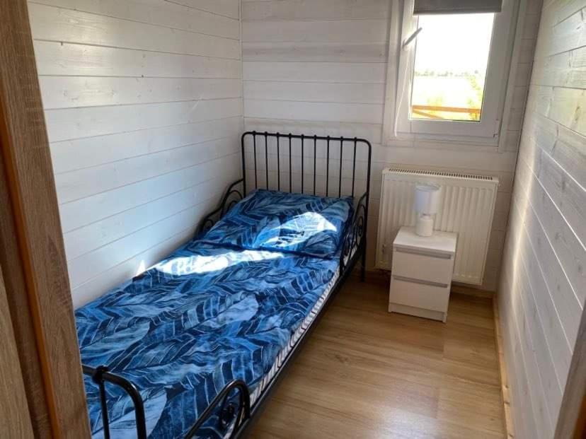 Voodi või voodid majutusasutuse Ranczo Wiejska Matka toas