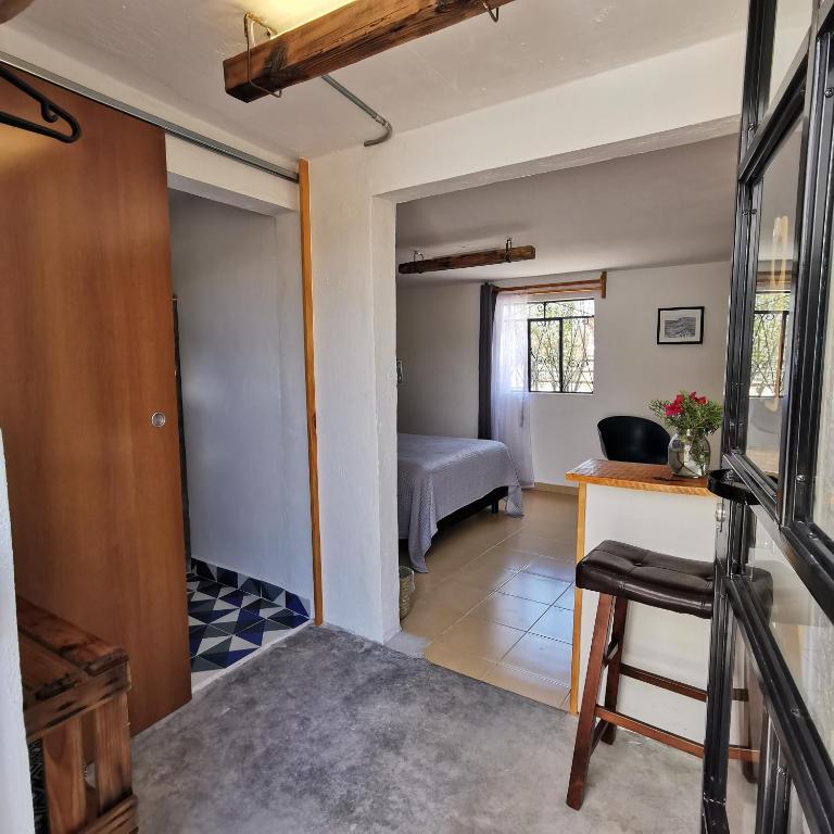 Postel nebo postele na pokoji v ubytování Finca del Pomar