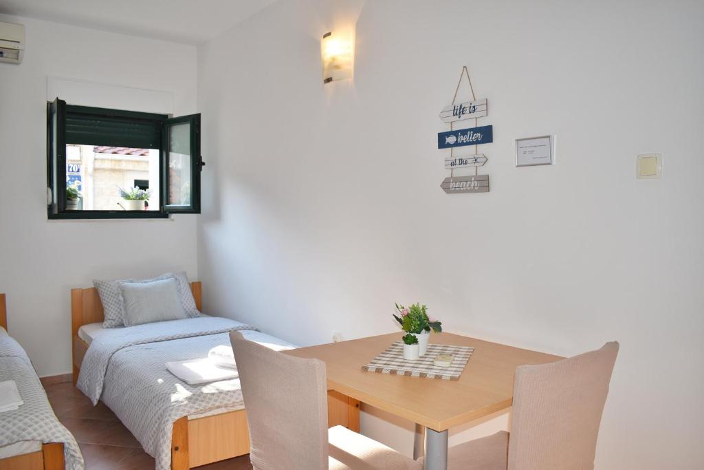 Postel nebo postele na pokoji v ubytování Twin Love Apartment