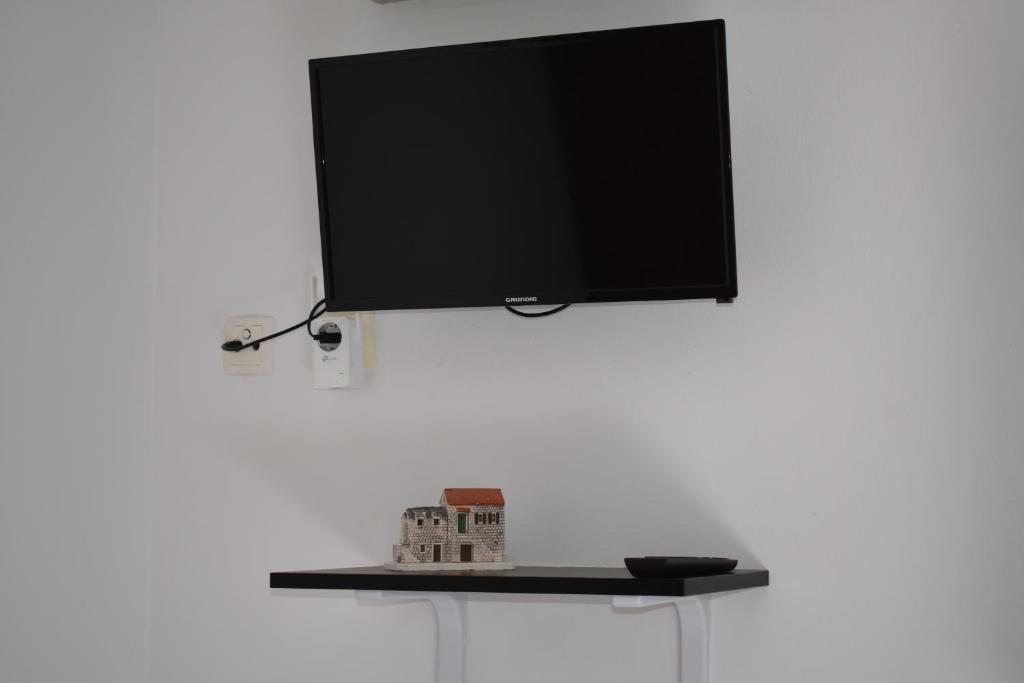 TV a/nebo společenská místnost v ubytování Twin Love Apartment