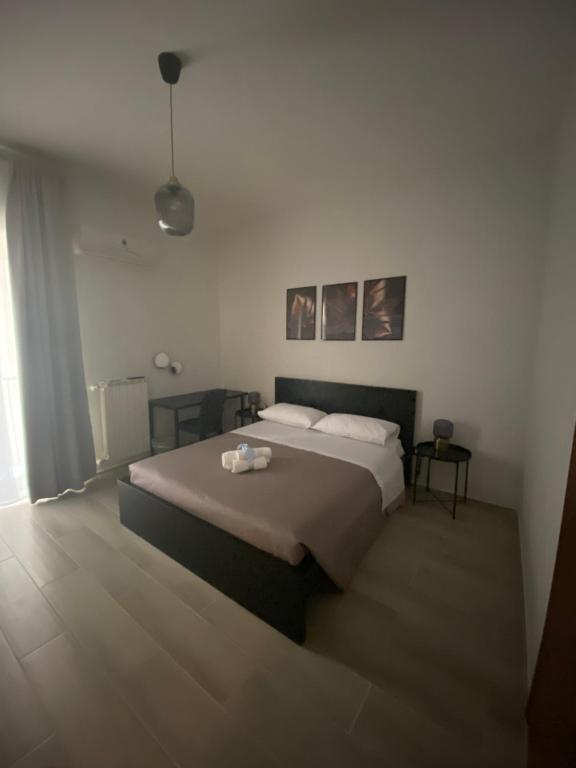 Postel nebo postele na pokoji v ubytování Home Demetra