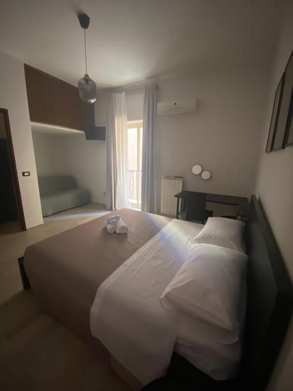 Postel nebo postele na pokoji v ubytování Home Demetra