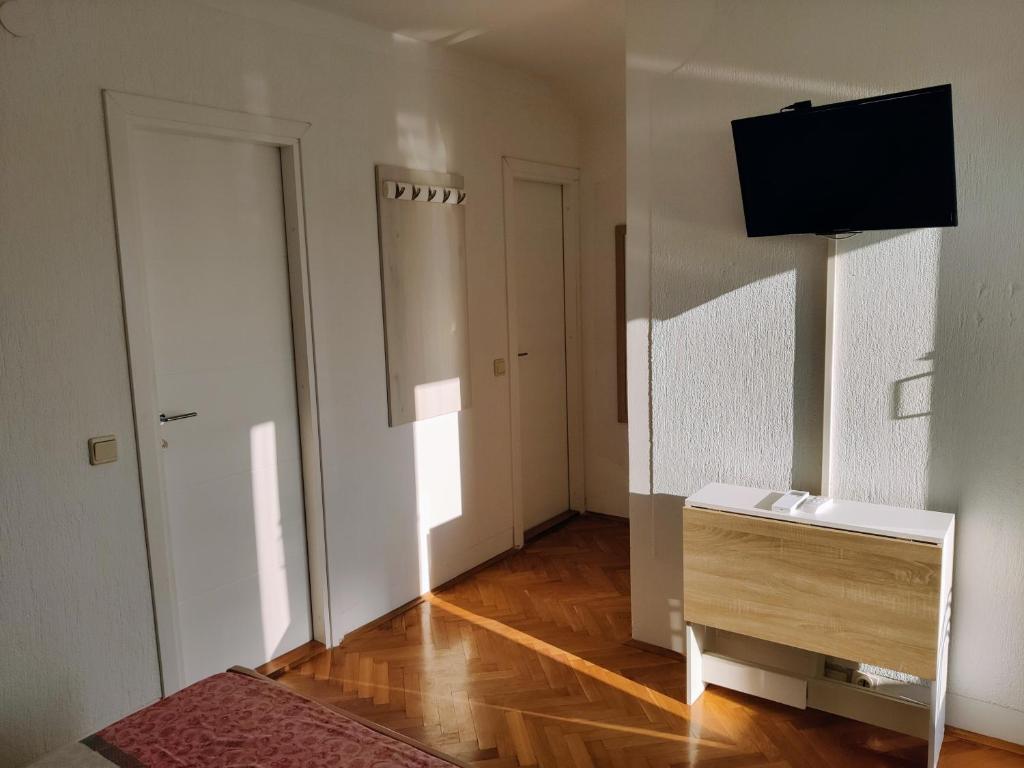 TV a/nebo společenská místnost v ubytování La Casa di Elisa