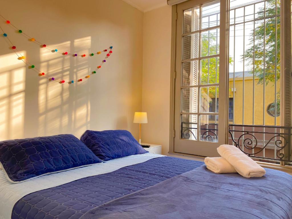 Postel nebo postele na pokoji v ubytování MAKTVB Brasil - Hostal Boutique