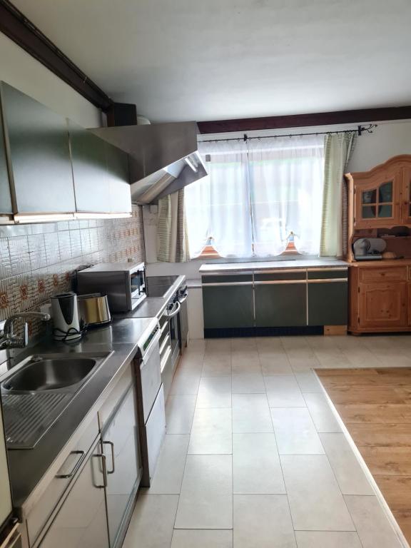 Kuchyň nebo kuchyňský kout v ubytování Gästehaus Gamsblick