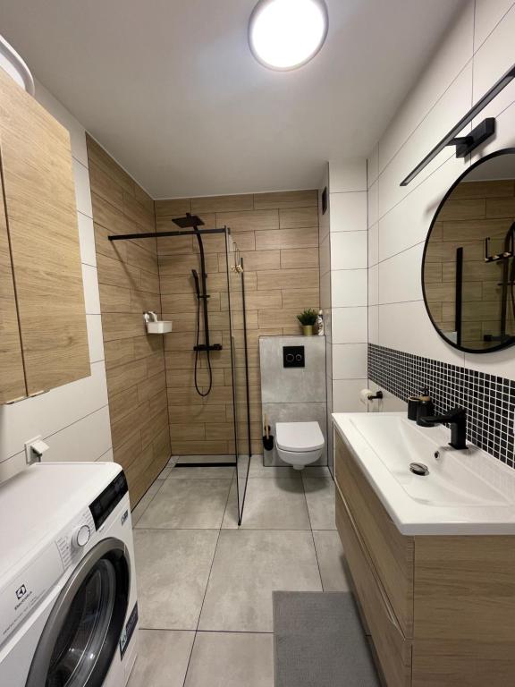 Kúpeľňa v ubytovaní Apartament z basenem i ogródkiem Baltic Sun A17