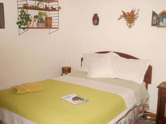 Ένα ή περισσότερα κρεβάτια σε δωμάτιο στο Hostal Don Mariano