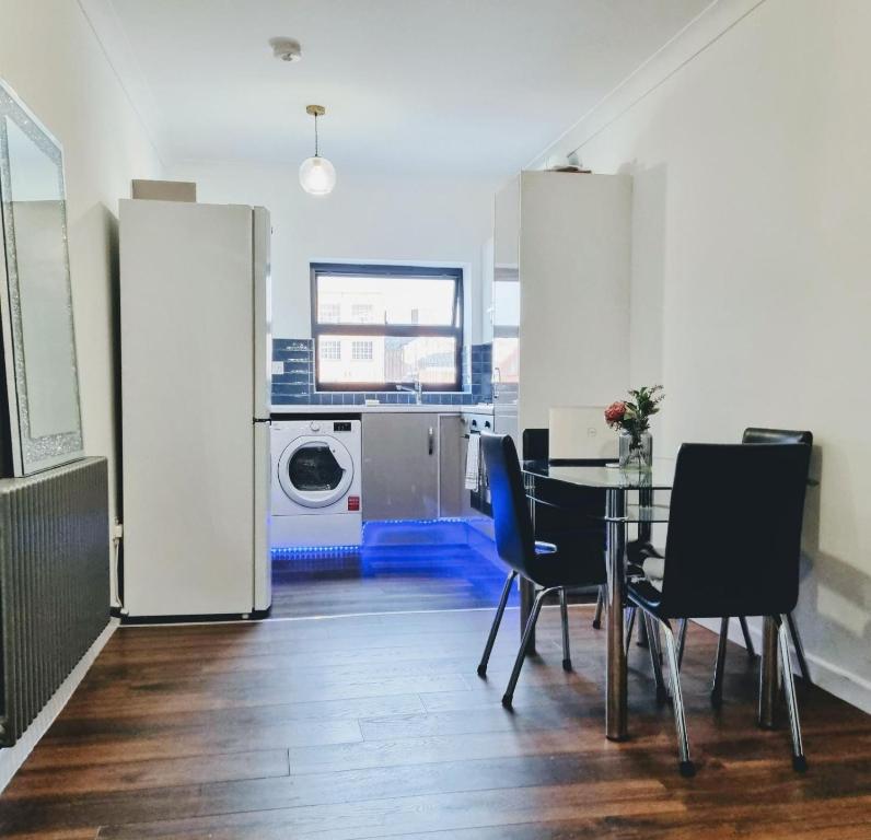 Η κουζίνα ή μικρή κουζίνα στο Beautiful Modern Apartment on Wick Lane