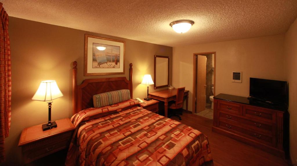 TV a/nebo společenská místnost v ubytování Executive Motel