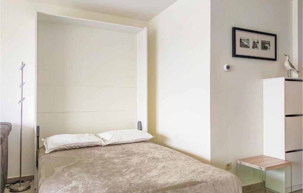 Posteľ alebo postele v izbe v ubytovaní 2 Bedroom Cozy Apartment In Oostende