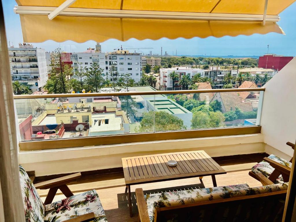 a large window with a view of a city at OceanParc - Vue sur Mer et Parc 24H Sécurité in Mohammedia