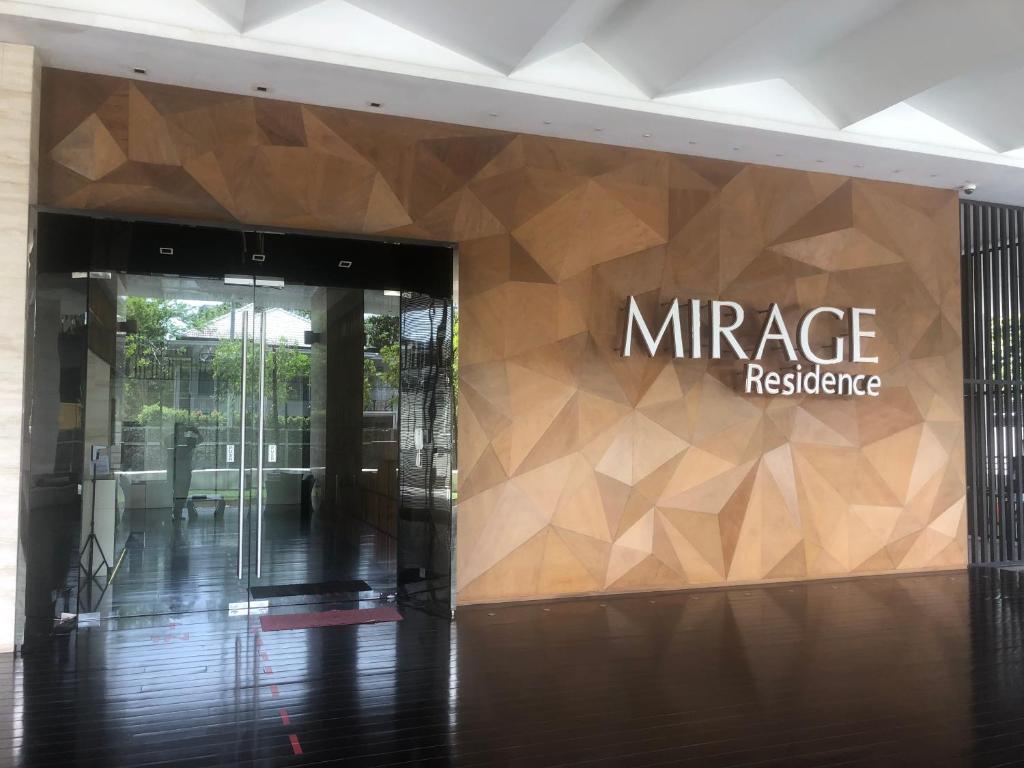a entrance to a office building with a sign on it at The Mirage Yks in Kuala Lumpur