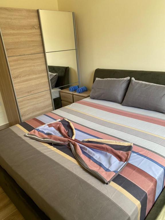 Postel nebo postele na pokoji v ubytování Milenium Apartments