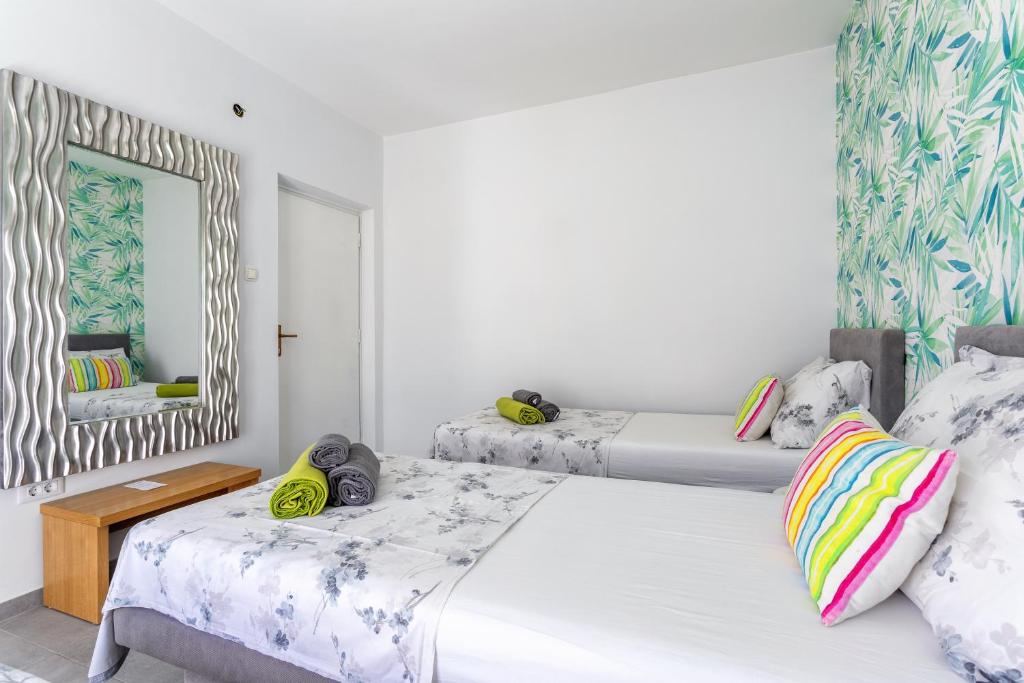 Postel nebo postele na pokoji v ubytování Hostel Villa Skansi