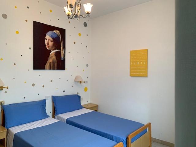 Postel nebo postele na pokoji v ubytování Albergo Stella