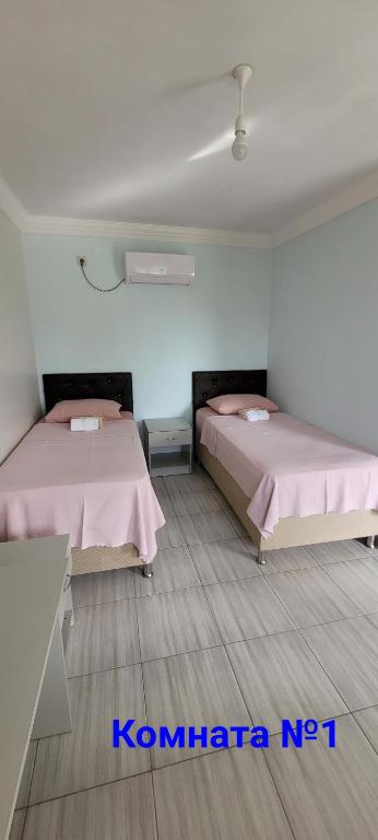 Postel nebo postele na pokoji v ubytování Apsa Butik Hotel