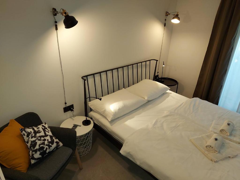 Postel nebo postele na pokoji v ubytování Bed & Breakfast Mozaik