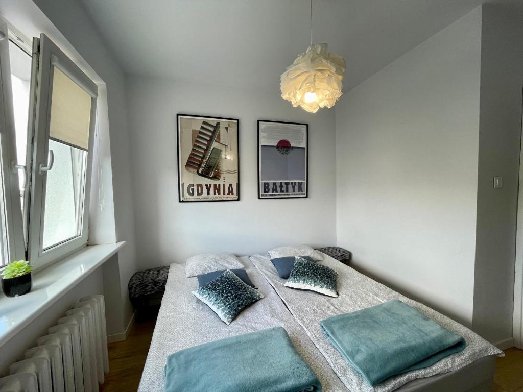 Postel nebo postele na pokoji v ubytování Pokoje w Orłowie