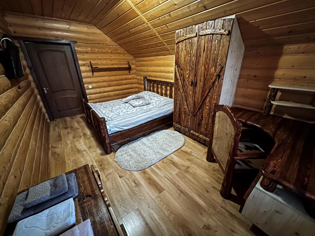 Postel nebo postele na pokoji v ubytování GorodOk
