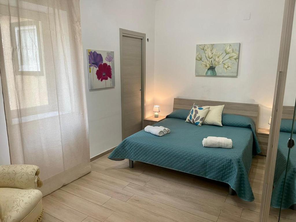 Posteľ alebo postele v izbe v ubytovaní Maqueda Apartament for 4 Palermo Centre Ballarò