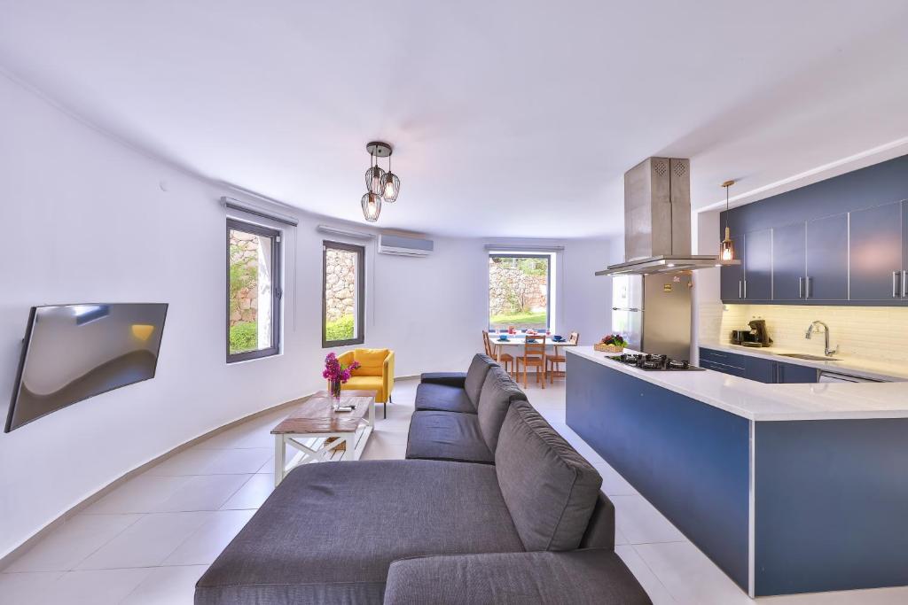 A kitchen or kitchenette at Villa Roxy 3 BR villa with one of the most unique gardens in Kalkan