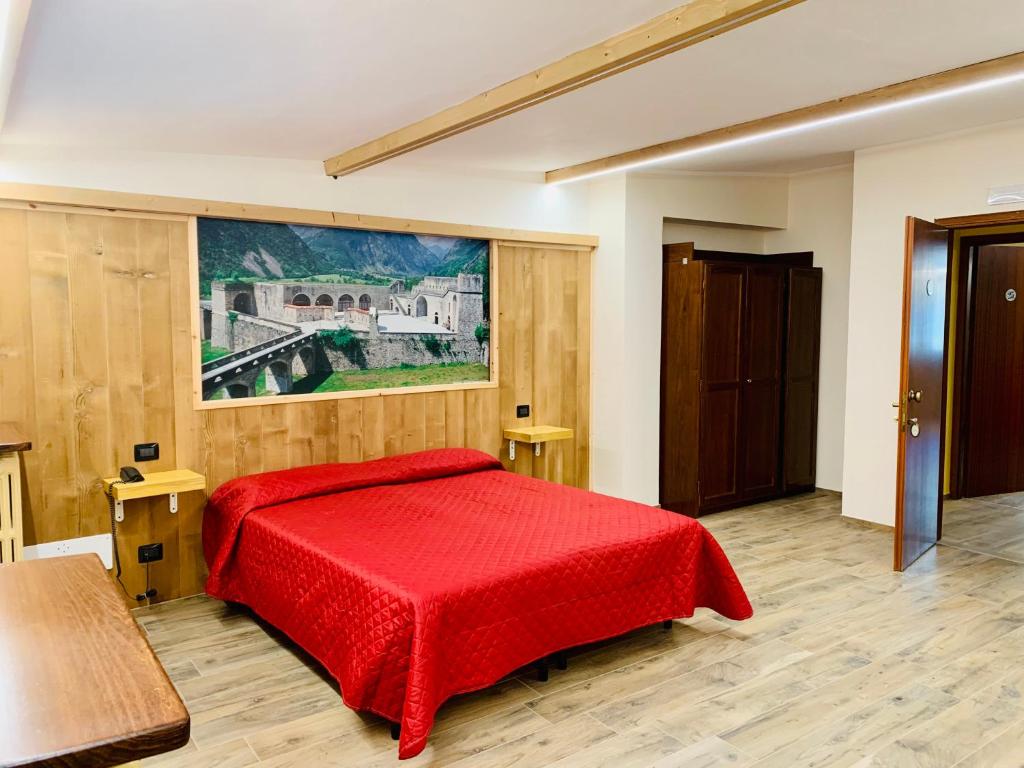 Postel nebo postele na pokoji v ubytování Hotel Ristorante Ligure