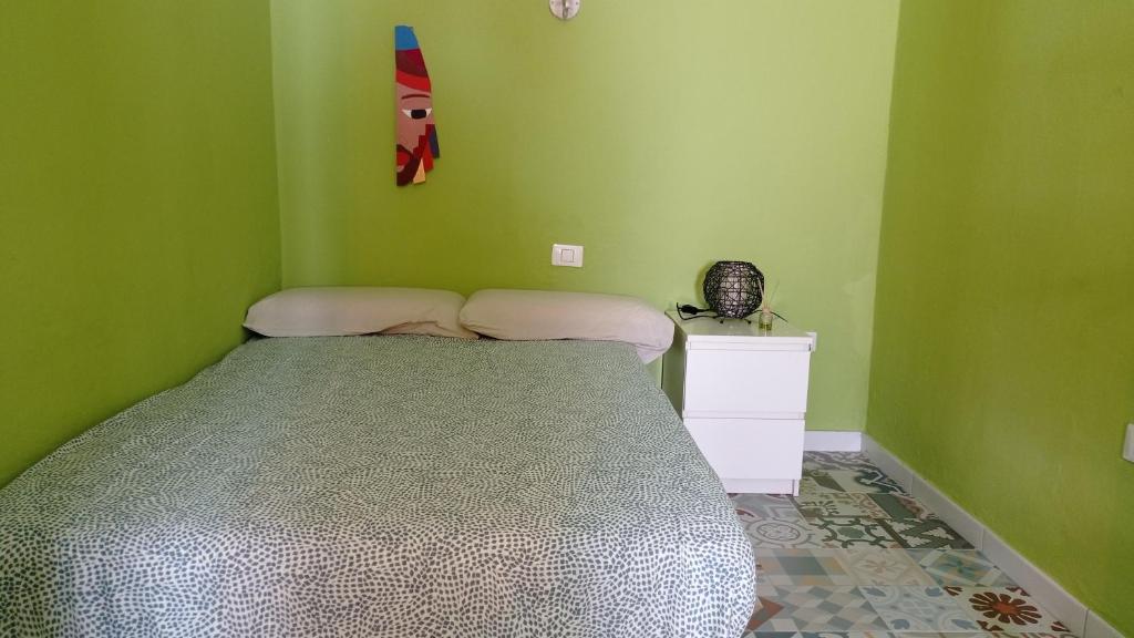 Postel nebo postele na pokoji v ubytování Casa Mamre