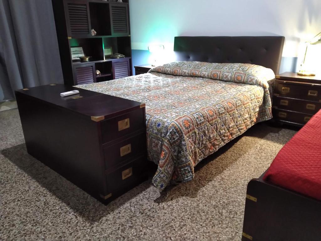 Postel nebo postele na pokoji v ubytování Il Genio del Porto - Mabbonath b&b