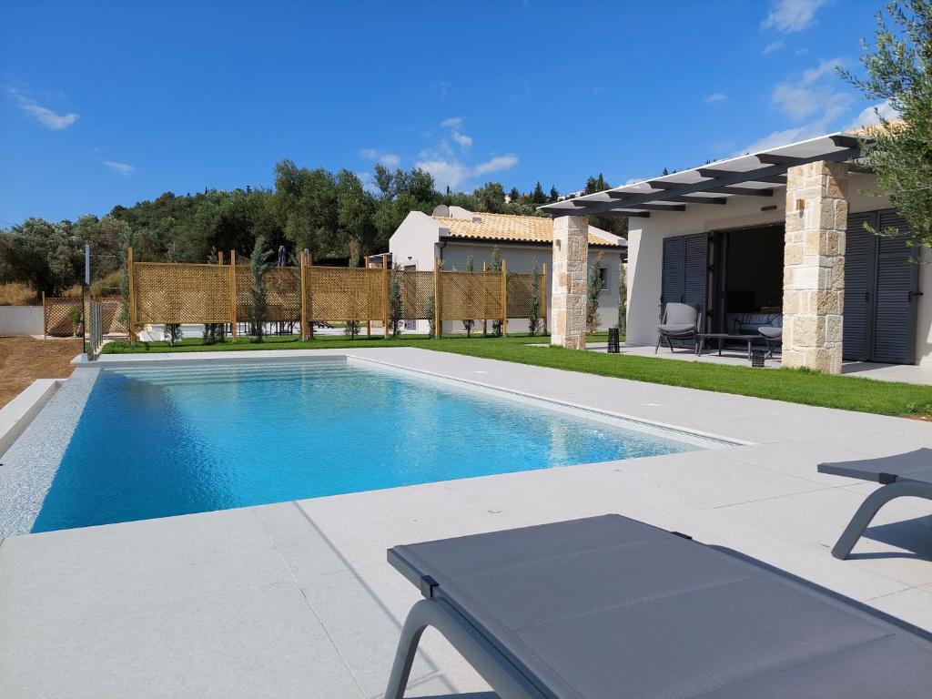 Bazén v ubytování Alekos Beach Houses-Elia Villas nebo v jeho okolí