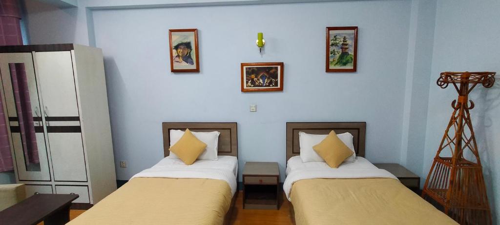 Postel nebo postele na pokoji v ubytování Hotel Pristine