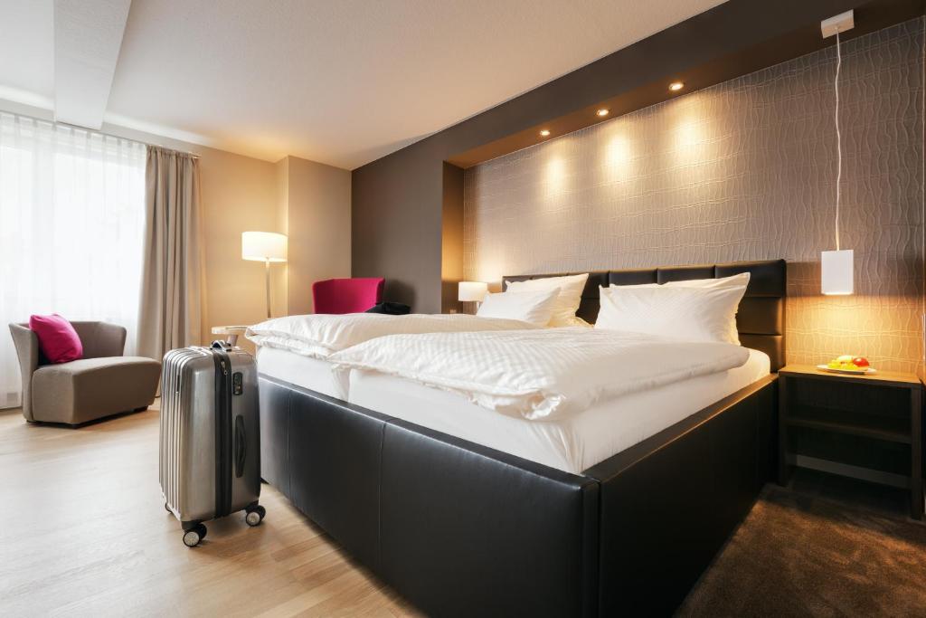Postel nebo postele na pokoji v ubytování Hotel Hiemann - Superior