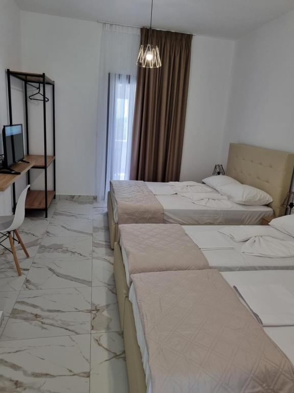 Postel nebo postele na pokoji v ubytování MANGO Skiathos