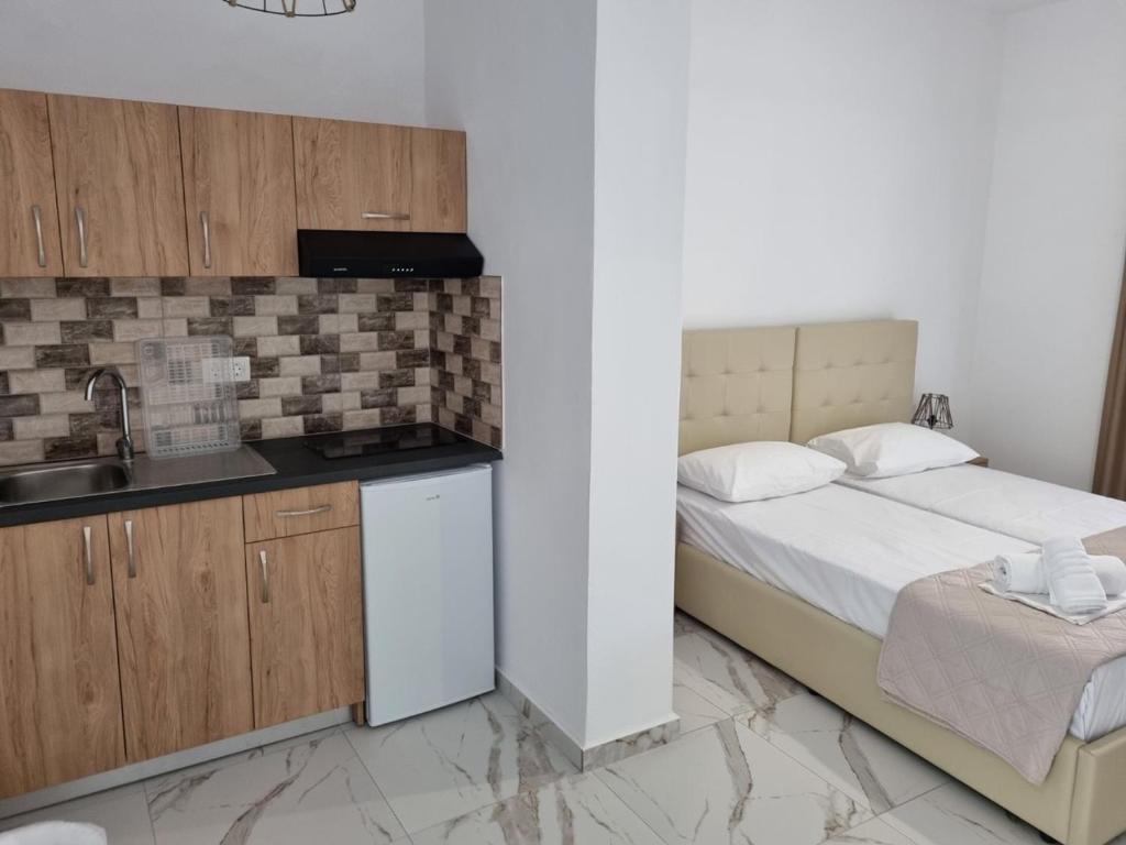Postel nebo postele na pokoji v ubytování MANGO Skiathos