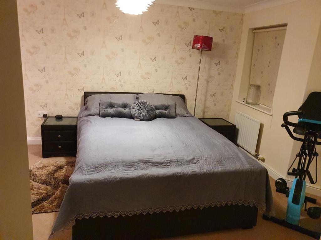 Ένα ή περισσότερα κρεβάτια σε δωμάτιο στο Beautiful ensuite room