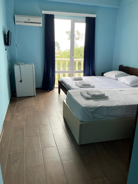 Postel nebo postele na pokoji v ubytování Hotel Orbita Ureki