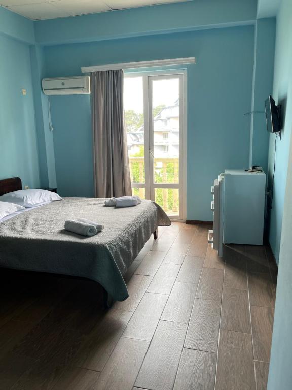 Postel nebo postele na pokoji v ubytování Hotel Orbita Ureki