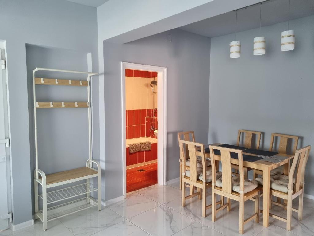 Posteľ alebo postele v izbe v ubytovaní Lilian apartmanház