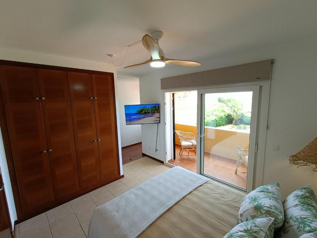 Posteľ alebo postele v izbe v ubytovaní VILLA VEGA RELAX EN EL PARAISO