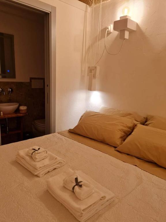 Posteľ alebo postele v izbe v ubytovaní Lacy's Luxury Suite Ostuni