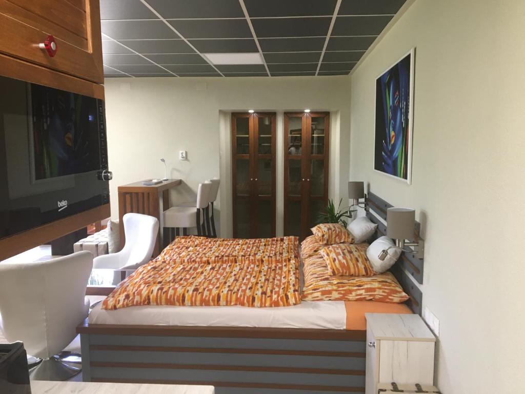 Postel nebo postele na pokoji v ubytování E 14
