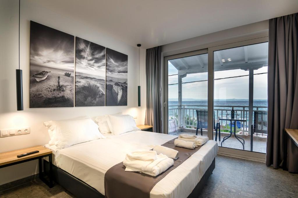 Un pat sau paturi într-o cameră la Votsalo Apartments