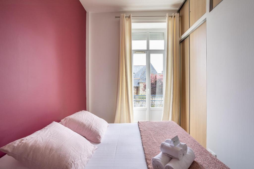 Łóżko lub łóżka w pokoju w obiekcie Victoria Belle Vue