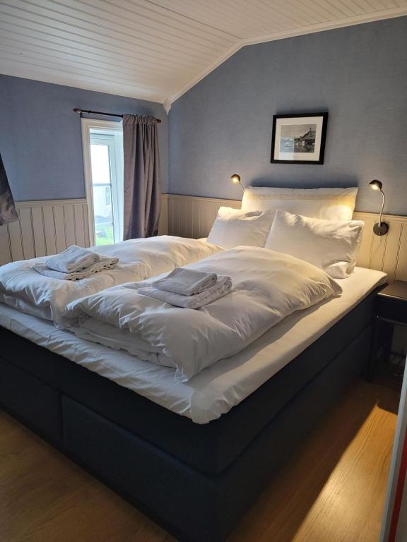Postel nebo postele na pokoji v ubytování Ona Havstuer - by Classic Norway Hotels