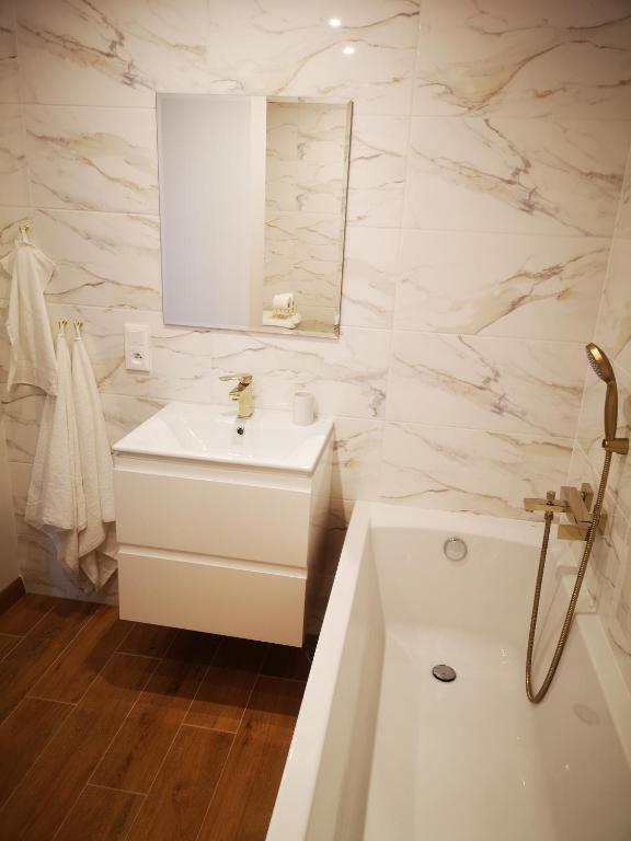 Kúpeľňa v ubytovaní Apartament Korczaka Centrum