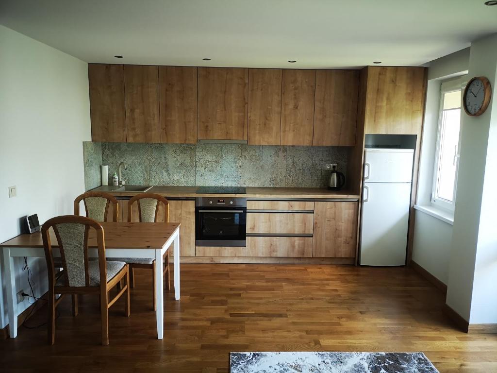 Kuchyňa alebo kuchynka v ubytovaní Apartament Korczaka Centrum