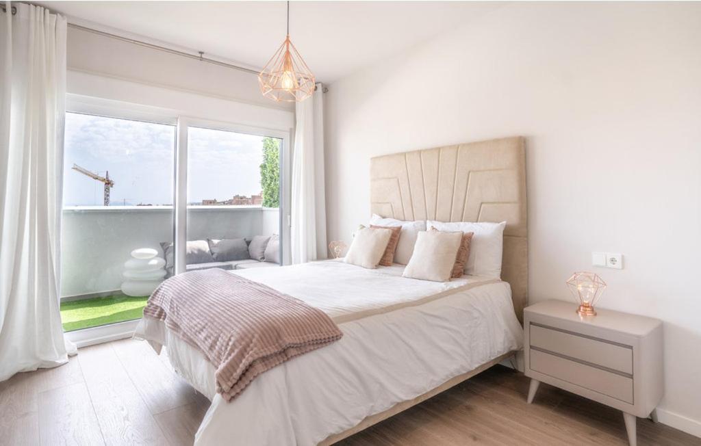 Postel nebo postele na pokoji v ubytování Apartamento en la costa