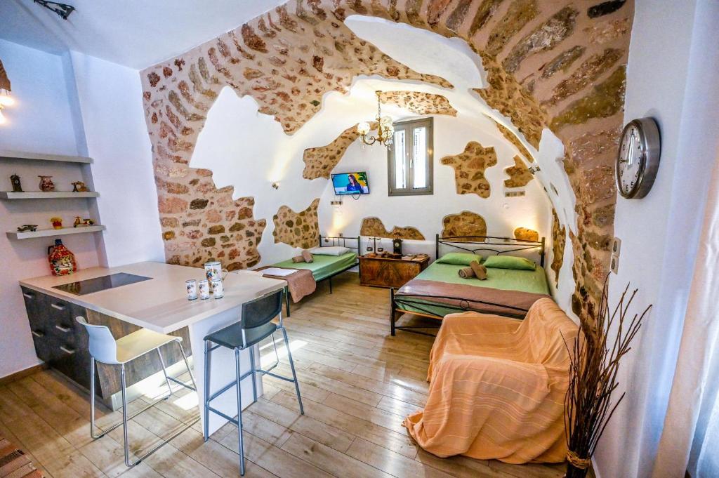 Posezení v ubytování Καμάρα Χωριό Φοινίκι , Kamara Finiki Village