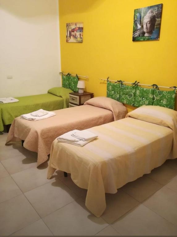 Posteľ alebo postele v izbe v ubytovaní Casa Vacanze Vista Mare