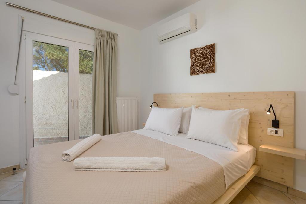 Posteľ alebo postele v izbe v ubytovaní Icabaru Zante Holiday House